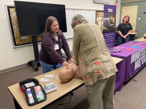 Johanna Sanders advises on CPR technique during a Minutes Matter open forum training session at LindenPointe in Hermitage.