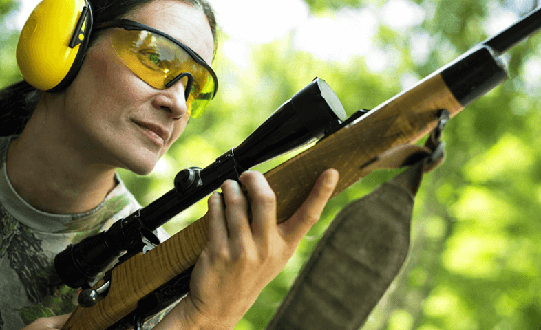 Woman holding a rifle